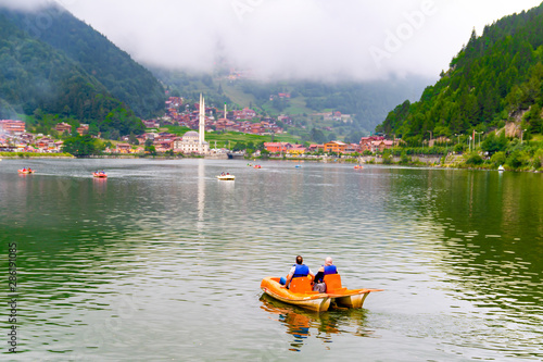 Panoramic view of Uzungol which is a tourist attraction in Trabzon, Turkey. The paddle boat on Uzungol.