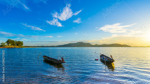 Fishing boat with sunset at Bang phra reservoir ,sriracha chon buri, thailand