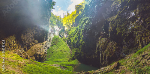 Macocha Gorge - The Macocha Abyss (Propast Macocha). Sinkhole in the Moravian Karst Punkva caves system of the Czech Republic. View from the bottom of the abyss.