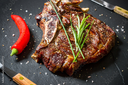 Grilled club steak on slate plate