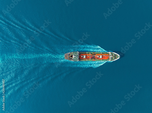 Aerial top view Oil ship tanker carier oil from refinery on the sea.