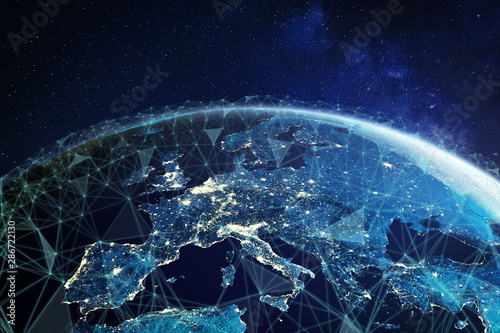 Telecommunication network above Europe viewed from space with connected system for European 5g LTE mobile web, global WiFi connection, Internet of Things (IoT) technology or blockchain fintech
