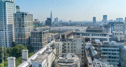Beautiful aerial view of the city of London against blue sky
