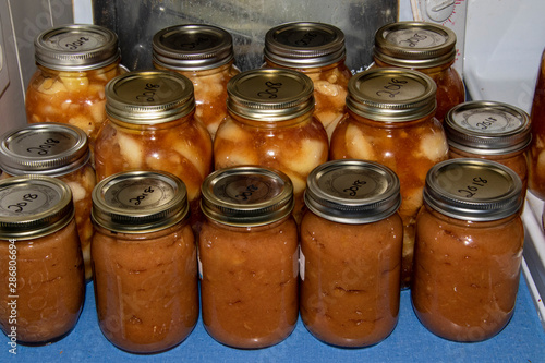 Jars of apple sauce and pie filling