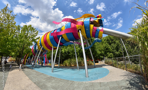 The garden of Dragon is a free play area for children in Parc de la Villette. The colorful Dragon slide, made of steel, measures 25 meters in length.