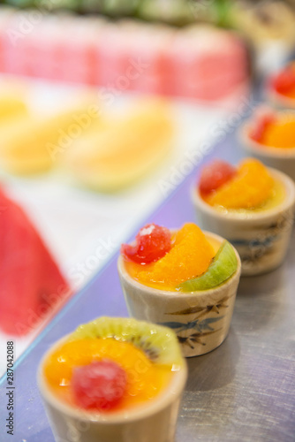 Fruit Cocktail Row on plate with blur background
