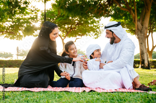 Arabian family spending time in a park