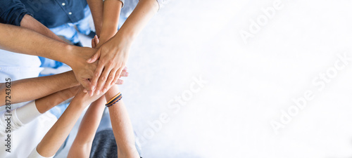 Stack of hands. Unity and teamwork concept.