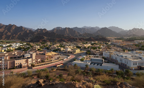 View from the top on town of Hatta and rocks in the background. Hatta is an enclave of Dubai in the Hajar Mountains, United Arab Emirates