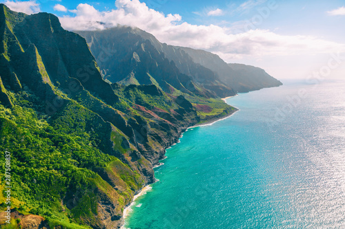 Hawaii Kauai lansdcape aerial view from the air helicopter flight. Amazing dramatic Na Pali coast of hawaiian island mountains, USA summer travel.