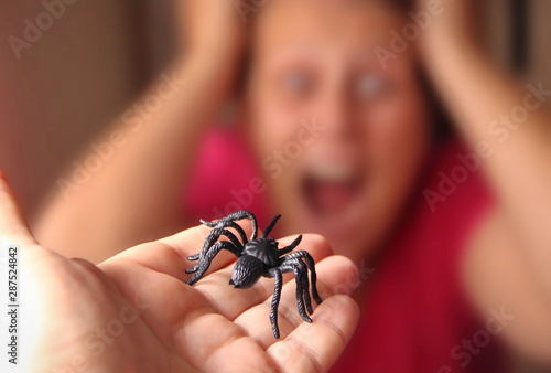 Spider in a hand, Arachnophobia