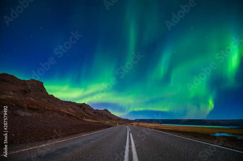Amazing Northern lights, aurora borealis at Vesturhorn mountain in Iceland
