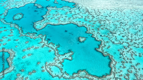 Aerial view of Great Barrier Reef in Whitsunday's Queensland Australia, famous love heart reef.