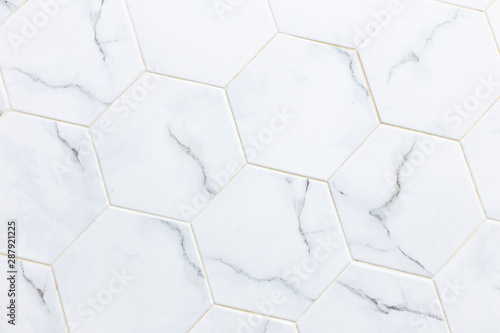 White hexagon marble tile wall for texture background.