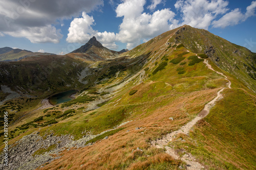 Path throught west Tatra Mountains with view on Volovec and Ostry Rochac.