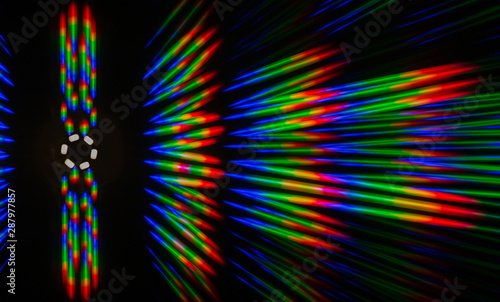 Photo of the diffraction pattern of LED array light, comprising a large number of diffraction orders obtained by the thin phase gratings