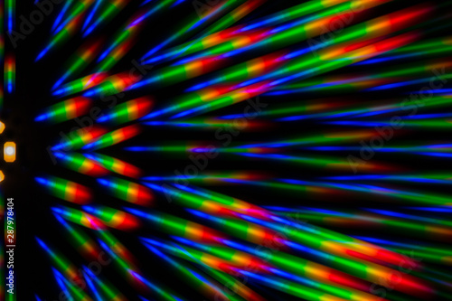 Photo of the diffraction pattern of LED array light, comprising a large number of diffraction orders obtained by the thin phase gratings