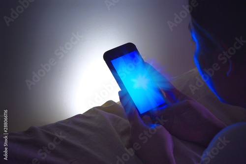 The blue light from the phone destroys the nervous system of the eye. Which is bad for the body.