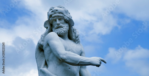 Ancient statue of Hercules (Heracles) is a Roman hero and god. He was the son of Zeus (Jupiter) and the mortal Alcmene.