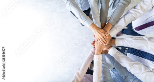 Stack of hands. Unity and teamwork concept.