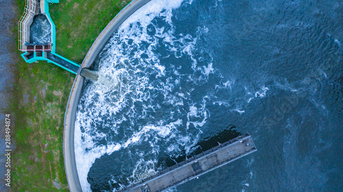 Aerial view blackwater treatment tank with waste water, Circle circular water clarifier cleaning water.