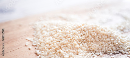 Sesame seeds isolated on white background top view. panorama