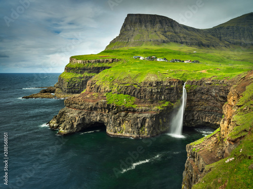 giant waterfall curved of strong wind on Faroe islands Big size