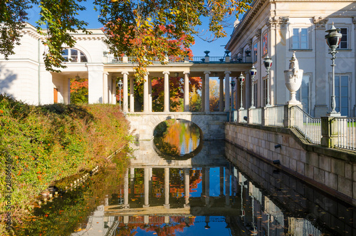 The bridge over the canal leading to the Palace on the isle also called the Palace on the Water in the palace-and-garden complex Royal Bath in Warsaw