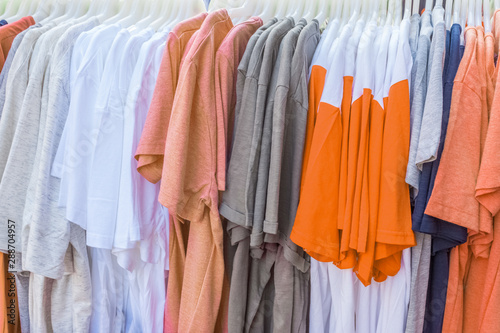 clothes on hangers, tee-shirts 