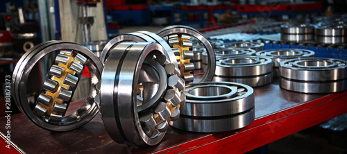 Production of bearings at the factory. Chrome plated surface. Industrial theme.Photos at the factory.Banner