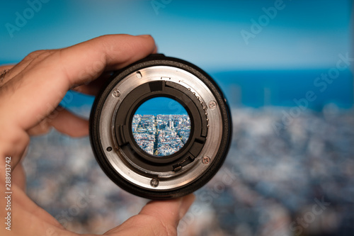 Barcelona general view through camera lens. Photography and travel concept.