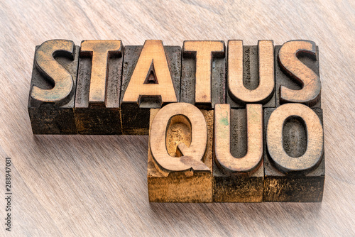 status quo words in wood type