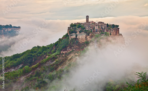 Civita di Bagnoregio, Viterbo, Lazio, Italy: landscape at dawn with fog