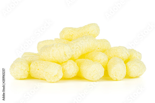 Lot of whole salted yellow corn puff isolated on white background