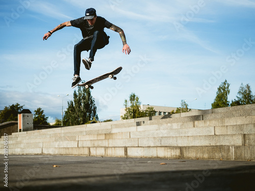 Skateboarder doing a trick on the skateboard