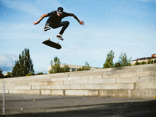 Skateboarder doing a trick on the skateboard