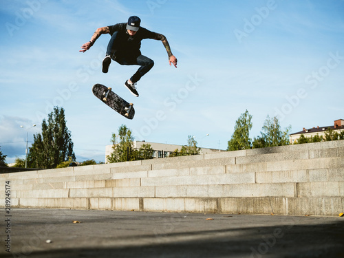 Skateboarder doing a trick on the skateboard