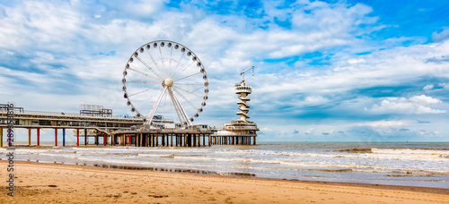 Panoramic landscape view of the Ferris Wheel and the Pier at Scheveningen.