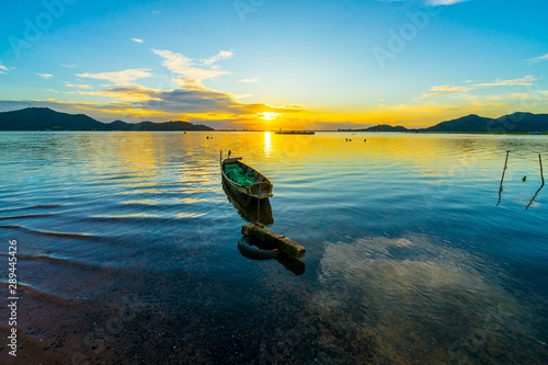 Fishing boat with sunset at Bang phra reservoir ,sriracha chon buri, thailand