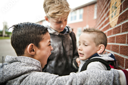 sad intimidation moment Elementary Age Bullying in Schoolyard