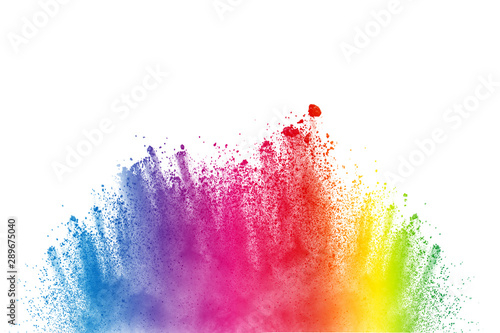 Abstract multi color powder explosion on white background. Freeze motion of dust particles splashing. Painted Holi in festival.