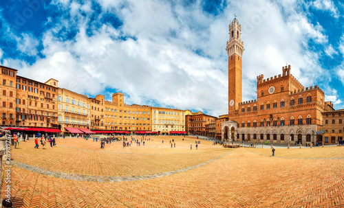 Panorama of Piazza del Campo (Campo square) and Torre del Mangia (Mangia tower) in Siena, Tuscany, Italy. Architecture and landmark of Siena, Tuscany, Italy. Attractions of Tuscany, Italy