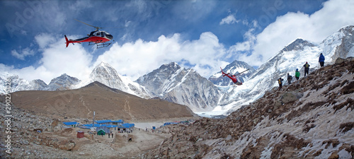 Everest base camp Gorak Shep rescue helicopters in action Himalayas Nepal, small settlement that sits at its edge at 5,164 m elevation, near Mount Everest