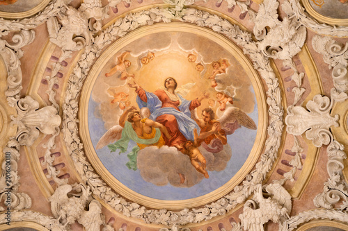 RIVA DEL GARDA, ITALY - JUNE 13, 2019: The ceiling fresco of Assumption of Virgin Mary in church Chiesa di Santa Maria Assunta (Cappella del Suffragio) by Giuseppe Craffonara (19 cent.).