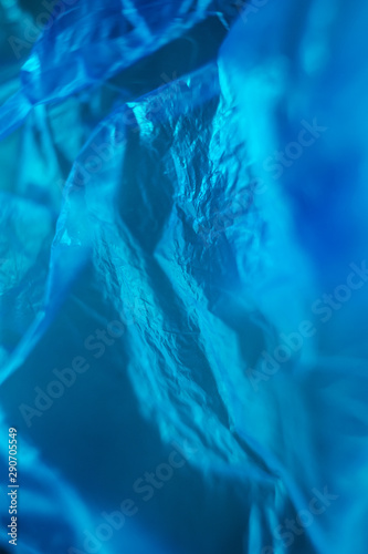 Cellophane blue bag close-up, macro photo. Abstract image.