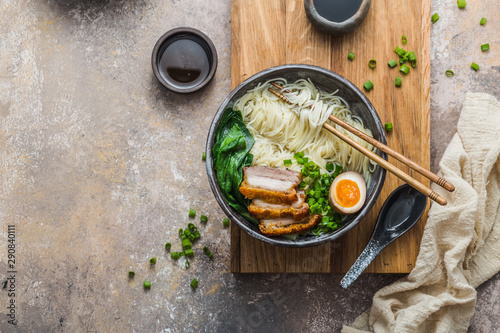 Delicious ramen soup with pork, egg and bok choy, copy space