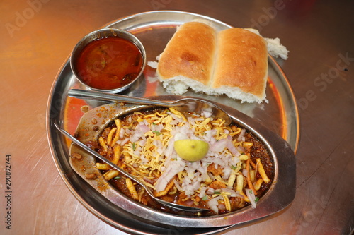 Close up view of indian street food in Mumbai. Maharastra fast food- missal pav.