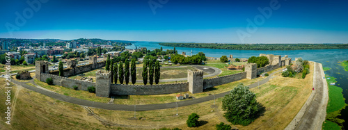 Aerial panorama of Smederevo (Szendro) Byzantine and Ottoman castle and walled town along the Danube river in Serbia former Yugoslavia with moat and towers