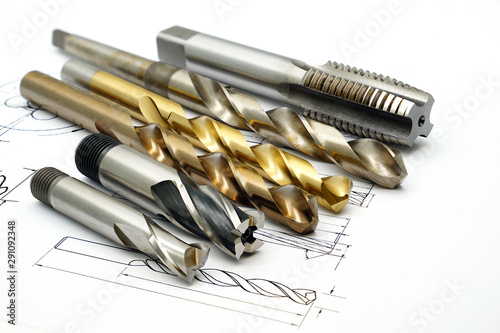 Professional cutting tools used for metalwork. Multi-flute drill, broach bit, Stainless Drill bit, Tap for thread