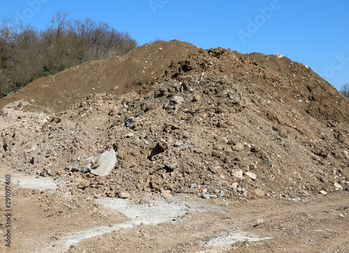 huge pile of earth excavated by a construction site